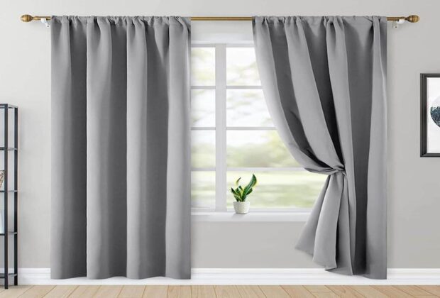 What are the benefits of using blackout curtains in interior design
